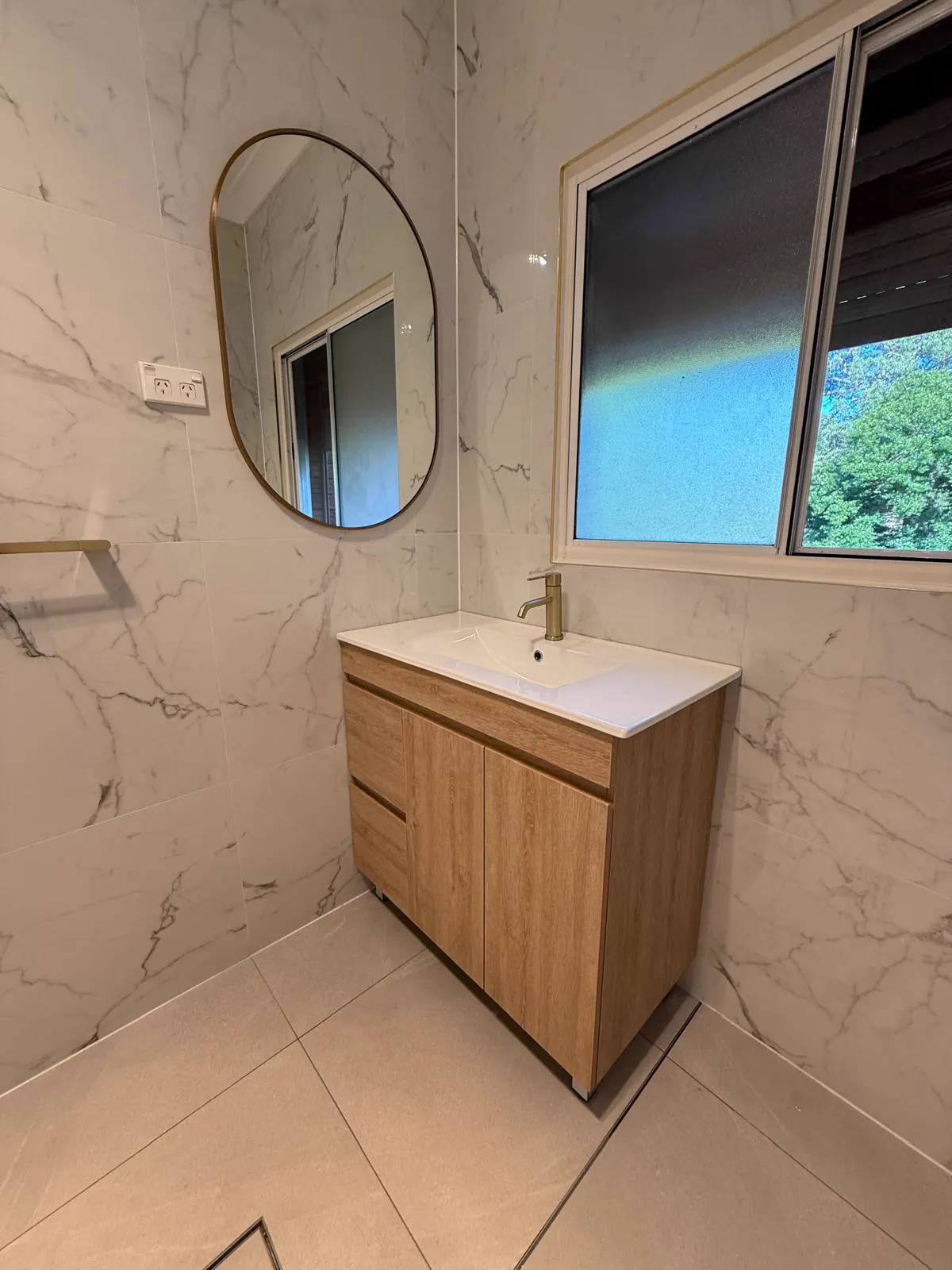 Bathroom detail — marble tiling close-up